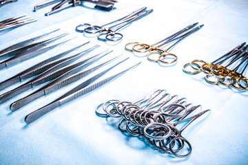 Sterile medical instruments on the table in the operating room.
