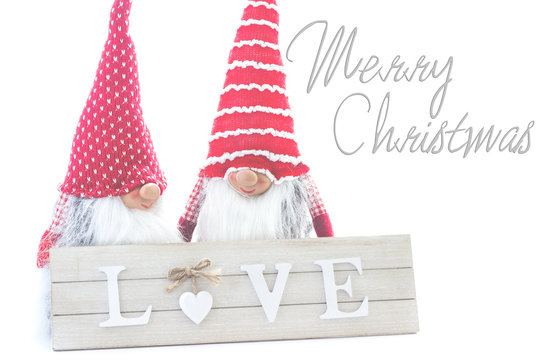 duendes de navidad con la palabra amor y merry christmas