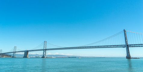 Bay bridge in San Francisco, clear blue sky