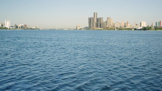 Wide Shot Detroit River With City In Distance