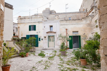 Fototapeta na wymiar View of the ancient patio of Matera (Sassi di Matera), European Capital of Culture 2019, Basilicata, Southern Italy
