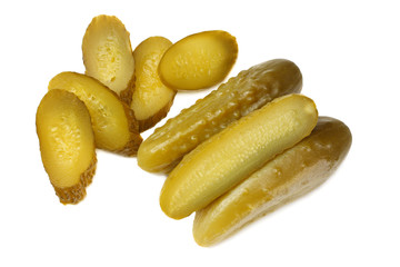 sliced marinated pickled cucumbers isolated on white background. top view