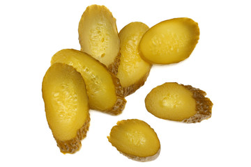 sliced marinated pickled cucumbers isolated on white background. top view