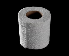 Toilet paper roll isolated on black background with clipping path