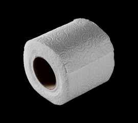 Toilet paper roll isolated on black background with clipping path