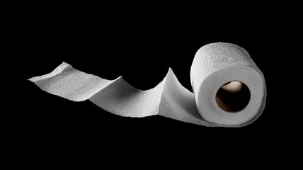 Toilet paper roll isolated on black background with clipping path