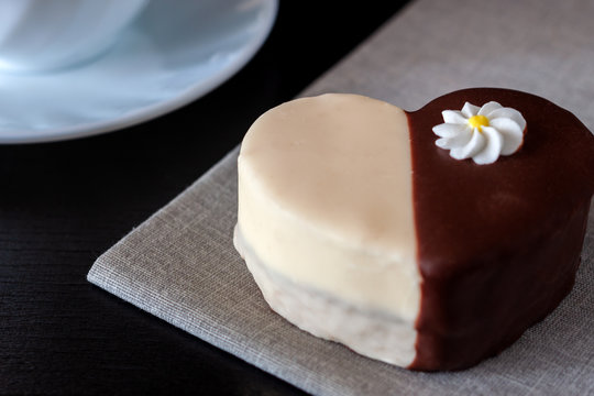 Chocolate covered biscuit in the shape of a heart