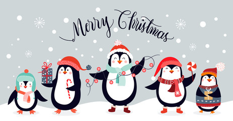 Christmas card design with cute penguins isolated on an winter background