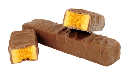 Chocolate covered honeycomb toffee bars isolated on a white background