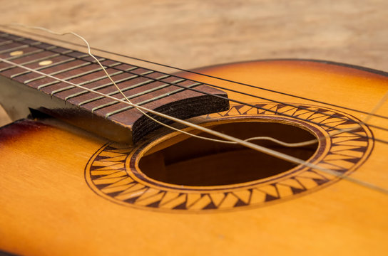 Broken guitar strings, guitar repair