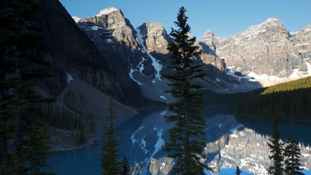 morning pan of moraine lake from the rockpile in the valley of the ten peaks at banff national park in canada