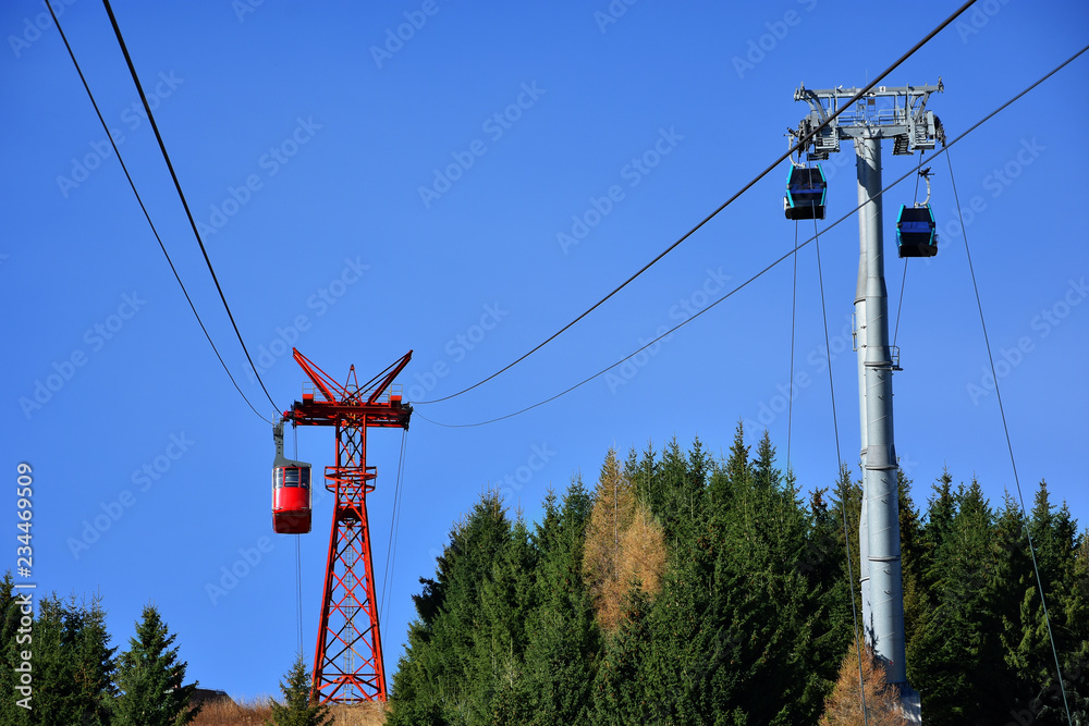 Canvas Prints Red cable car and gondola ride transportation at 2000m in Bucegi Mountains, autumn season, Sinaia, Romania