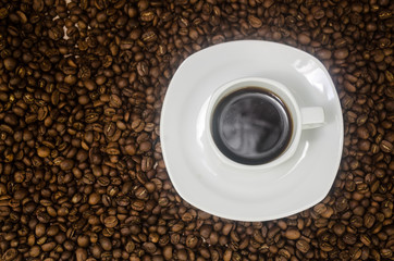 Coffee mug over grain texture