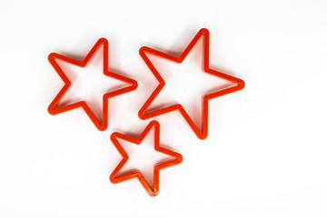 Cookie cutter star shape on white background