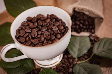 black coffee beans in a sack