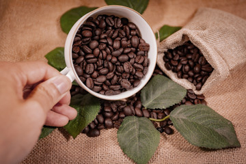 black coffee beans in a sack
