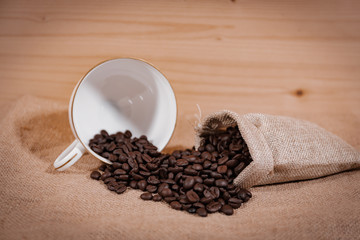 black coffee beans in a sack