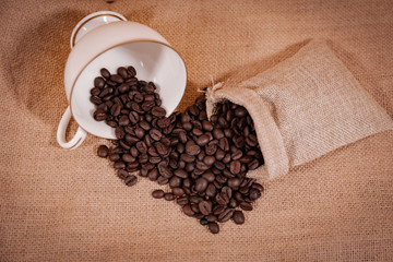 black coffee beans in a sack