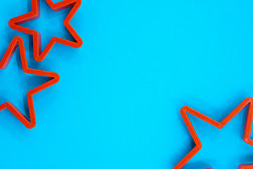 Cookie cutter star shape on blue background