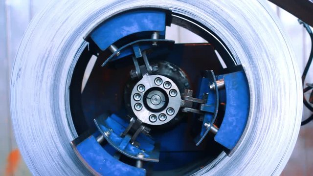 Cold rolled steel coil in action. Galvanized steel sheet in metal work