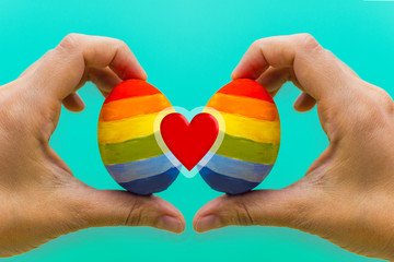 LGBT concept. two colored eggs in the hands
