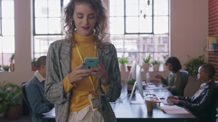 happy caucasian business woman using smartphone browsing social media messages texting on mobile phone enjoying diverse office workplace female manager walking confident slow motion - Powered by Adobe