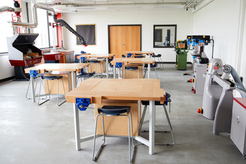 Fototapeta na wymiar View Of Work Benches And Machinery In High School Design And Technology Classroom