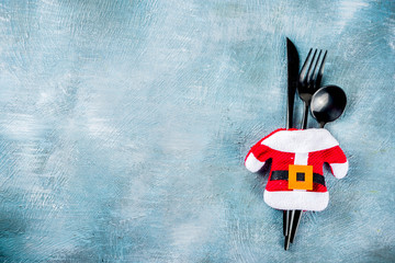 Christmas dinner table place setting with Santas xmas stocking