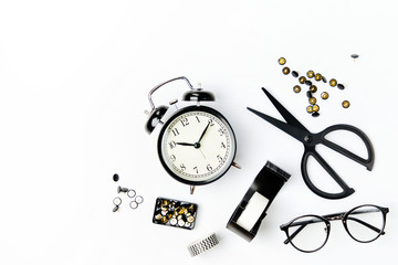 Business Stationery with alarm clock on on white background. Flat lay, top view