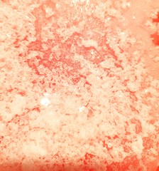 Salt granules on pink backgound