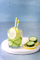Glass of Detox Infused Water with Cucumber and Lemon Healthy Refreshing Drink Vertical