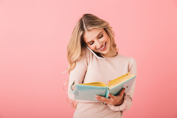 Portrait of a cheerful young woman wearing sweater