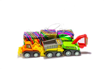 toy car and gift box on white background