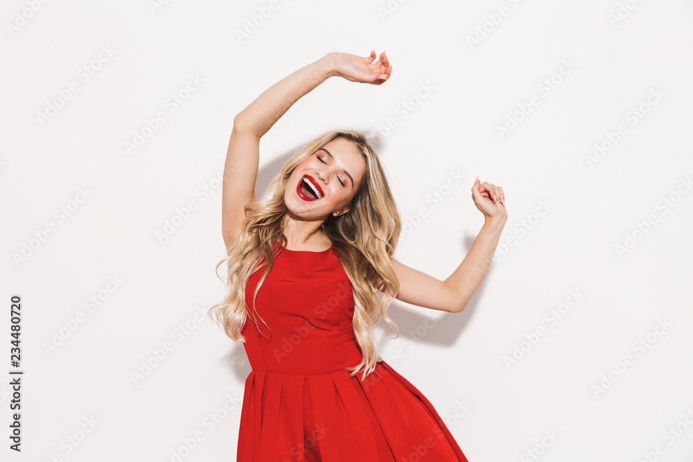 Poster Portrait of a cheerful young woman in red dress