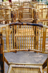 Comfortable chairs made with wooden sticks during an event