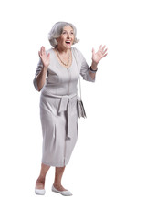 Beautiful senior woman posing isolated on white background