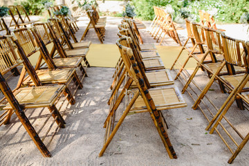 Comfortable chairs made with wooden sticks during an event