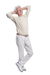 Full growth, senior man posing on white background