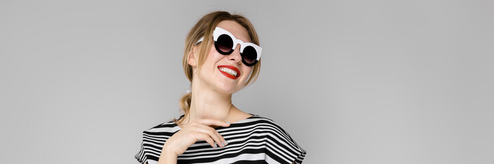 Fototapeta premium Woman in fashionable clothes and sunglasses