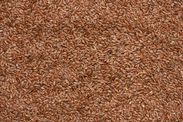 Background of brown linseeds.