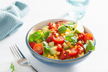 healthy vegan avocado sweetcorn tomato salad