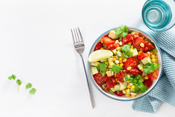 healthy vegan avocado sweetcorn tomato salad