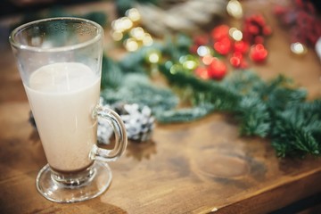 glass of milk and cookies and Christmas decoration
