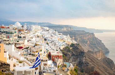 Panoramic view Traditional famous white houses and churches in Thira town on Santorini island,...
