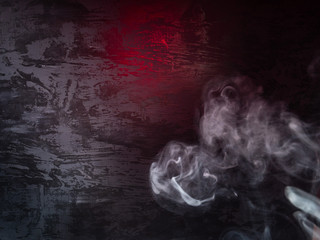 Dark background with smoke and red highlights © Elena