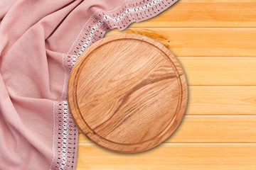 Table cloth and pizza board on vintage wooden table. Top view mockup