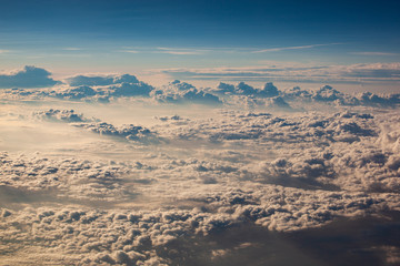 beautiful fluffy clouds from the window of the plane