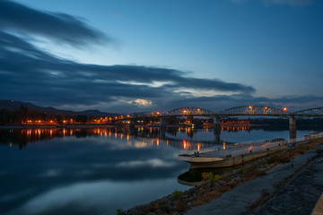 Fototapeta premium Scenic nightscape of Maria Valeria bridge with reflection in Danube river, Esztergom, Hungary at early morning