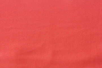 Red fabric texture for background.