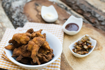 Breaded chicken breast with barbecue sauce and mayonnaise